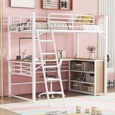 a white loft bed sitting next to a desk with a computer on top of it