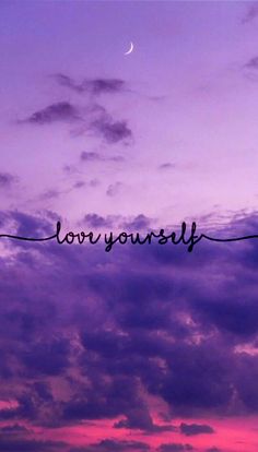 the words love yourself written on a purple sky