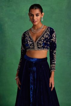 Blue blouse featuring embroidered floral jaal motifs highlighted by sequins, pearls and crystal embellishments. Comes with solid flared lehenga and floral butti embroidered dupatta. - Aza Fashions Elegant V-neck Choli With Resham Embroidery, Elegant V-neck Lehenga With Resham Embroidery, Bollywood Style Lehenga With V-neck And Mirror Work, Elegant V-neck Lehenga With Zari Work, V-neck Traditional Wear With Resham Embroidery For Party, Designer V-neck Choli With Resham Embroidery, Bollywood Lehenga With V-neck Unstitched Blouse, Elegant V-neck Choli With Mirror Work, Embellished V-neck Blouse For Reception