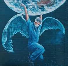 a painting of an angel holding up a globe