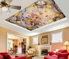 a living room filled with furniture and a painting on the ceiling