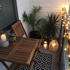 a small balcony with some lights on it