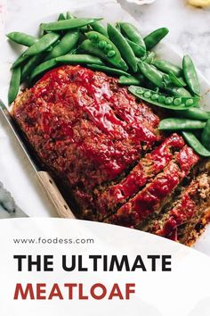 meatloaf with green beans on the side and text overlay that reads, the ultimate meatloaf