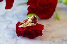 Metal: 14kt Yellow Gold Stone: Garnet Shape: Round Garnet Weight: 1.65 ctw Ring Size: 5 1/2 Sizing: Please state ring size in the personalization box. Weight of entire piece with stones: 3.50grams Width Of Top Part Of Ring : 10mm Customization: We can custom make this ring with any gems and metals. Please inquire if interested. White Gold Amethyst Version: https://www.etsy.com/listing/231479258/sale-vintage-style-14k-white-gold?ref=shop_home_active_7&frs=1 Rose Gold Aquamarine Version: https Elegant Yellow Gold Ruby Ring With Intricate Design, Yellow Gold Ruby Ring With Filigree For Anniversary, 14k Gold Filigree Ring With Intricate Design Gift, Yellow Gold Ruby Ring With Intricate Design As Gift, Gold Filigree Ruby Ring For Anniversary, Intricately Designed Yellow Gold Ruby Ring As Gift, Gold Ruby Ring With Filigree For Anniversary, Elegant 14k Gold Ruby Ring With Intricate Design, Intricate Design Ruby Ring In Yellow Gold As Gift