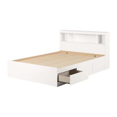 a white bed with drawers underneath it