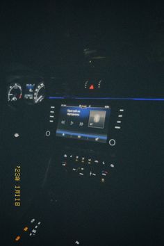 the interior of a car with dashboard lights and gauges