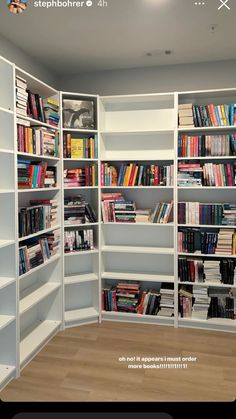 a white book shelf filled with lots of books