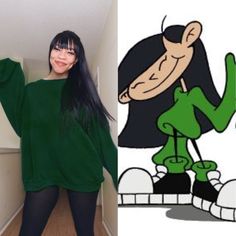 a woman with long black hair and green shirt standing next to cartoon character in hallway