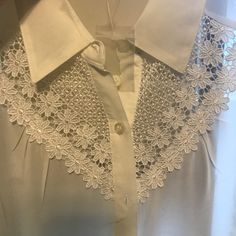 White Blouse With Nice Embroidery. Size Medium. It Has No Stains, No Holes, No Rips And No Pilling. The Blouse Is New But I Removed The Tags Thinking That I Would Wear It, You Can Still See Part Of The Tag In It. Blouse Is Very See Through On The Non-Embroidery Part. Summer Collared Lace Tops, Collared Lace Tops For Summer, Summer Lace Collared Tops, Summer Collared Lace Blouse, White Sleeveless Blouse With Lace Patchwork, Collared Lace Tops For Spring, Collared Lace Blouse With Lace Top, Collared Lace Blouse For Summer, Summer Lace Blouse With Collar