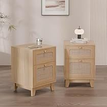 two wooden nightstands sitting next to each other on top of a hard wood floor