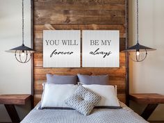 a bed with two signs above it that says you will be my forever always on the wall