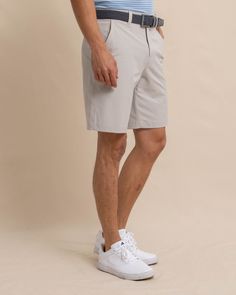 We took our best-selling shorts and made them longer, so you can exude cool, classic confidence from the clubhouse to the golf course. With a 10" inseam, these essential shorts are crafted with all the features you need, like brrr°® cooling technology, quick-dry fabric, slanted front hand pockets (with reinforced pocket bags ideal for the course), welted back pockets, and a rigid waist. Style: 10684 Summer Golf Shorts With 4-way Stretch, 4-way Stretch Golf Shorts For Summer, Spring Golf Bottoms With Built-in Shorts, Summer Golf Bottoms Short Length, Summer Golf Bottoms Short, Summer Golf Bottoms In Short Style, Casual Golf Shorts For Spring, Sporty Golf Shorts With 4-way Stretch, Sporty 4-way Stretch Golf Shorts