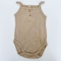 Play Up is a sustainable clothing brand with entirely Portuguese artisan design and manufacturing. They are committed to environmental preservation through their use of natural dyes, recycled fibers, and organic cotton. Sage tank onesie is made with organic cotton. Unisex Cotton Bodysuit For Summer, Casual Organic Cotton Onesie For Summer, Fitted Organic Cotton Casual Bodysuit, Fitted Casual Organic Cotton Bodysuit, Spring Casual Organic Cotton Bodysuit, Casual Brown Cotton Bodysuit, Summer Organic Cotton Onesie For Loungewear, Casual Beige Cotton Bodysuit, Unisex Organic Cotton Onesie For Summer