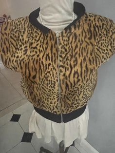 Yes another one of my favorites vest back in 1980's. This vest is super comfortable due to the material  and so much fun , who doesn't like a good leopard vest. tag reads Small. Material Acrylic and cotton. there is some stretch to it. Also, small shoulder pads Measurement's: Bust 17 inches Length 18 inches Feel free to contact me with any question This item is in excellent condition, with consideration it is vintage it is stored and cared for. No rips or stains.  All vintage pieces are final sale and cannot be returned or exchanged darlings. Sorry lovelies but I can only ship to the United States.  Please check back as I post weekly,  have over 100 more items  Follow me on Instagram@Full_of_Grace_Vintage58 Leopard Vest, Vest Outfits, Vintage Pieces, My Favorites, Womens Vest, Shoulder Pads, Force, Bathing Beauties, Size Small