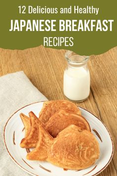 two pieces of bread sitting on top of a white plate next to a glass of milk