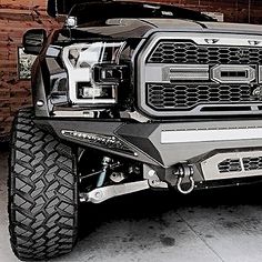 the front end of a truck parked in a garage