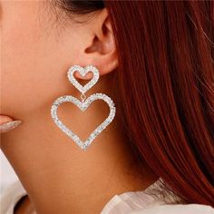 Xerling Clear Rhinestones Heart Earrings Iced Out Heart Shape Earrings For Women Girls Cute Dangle Heart Statement Earrings Fast Shipping Brand New In Box, Still Factory Sealed Click "Buy Now" Button To Place Order Secure, Verified Payments Via Facebook And Paypal Delivery: Estimated 3-5 Days Returns Accepted: Free 30-Day Returns. *Color: Silver. Length: 6cm/2.36inches; Width: 4.5cm/1.77inches. *Material: Rhinestone; Alloy. This Earrings Is Made Of Many Rhinestone Stones, If Any Problems Like St Heart-shaped Rhinestone Earrings For Valentine's Day, Glamorous Silver Heart Earrings For Anniversary, Glamorous Silver Heart Earrings For Valentine's Day, Crystal Heart Earrings With Rhinestones, Silver Heart Earrings With Rhinestones For Gift, Party Earrings With Open Heart Shape, Heart-shaped Crystal Earrings For Wedding, Silver Open Heart Earrings For Party, Glamorous Silver Heart Earrings With Rhinestones