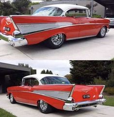 an old red and white car parked in front of a garage