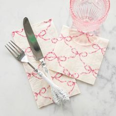 It’s time to think pink with these fun and festive napkins! Perfect for birthdays, baby showers, or any occasion that could use a sweet finishing touch, the Pink Bow Lattice Napkins are a great addition to your gathering. Beside the plate, on the bar, or throughout the home, Hester & Cook napkins are an elegant addition to any occasion and coordinate with many of your favorite designs. DETAILS: Cocktail: 4.9" x 4.9" folded, 9.8" x 9.8" flat 20 napkins per package Guest: 13” x 16.5” flat, 4.33” x Festive Napkins, Nora Fleming Minis, Round Top Collection, Baby Shower Napkins, Christmas Shower, Vintage Silverplate, Think Pink, Bar Glassware, Custom Stationery