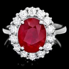 Formal Gia Certified Lab-created Ruby Ring, Gia Certified Oval Red Diamond Ring, Gia Certified Red Ruby Ring With Round Cut, Red Gia Certified Ruby Ring With Round Cut, Classic Red Oval Cluster Ring, Classic Red Oval Halo Ring, Luxury Red Diamond Ring With Gemstone, Red Diamond Halo Ring With Oval Shape, Red Oval Diamond Halo Ring