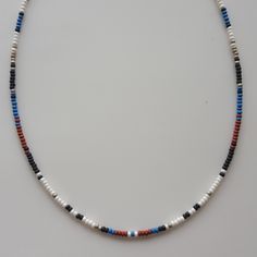 This Mens Bead Necklace consists of Black beads, white, blue, brown, gray glass beads. This Seed Bead Choker can be stacked with other necklaces for both men and women. Each Beach Necklace includes an extension chain of approximately 1 inch. I also used Surfer Necklace, Stainless Steel Jewelry wire, 24K Gold Plated Extension Chain, 24K Gold Plated Lobster Claw. Click on the link to see other  https://www.etsy.com/shop/dkSeedbead?ref=seller-platform-mcnav Beachy Necklace, Surfer Jewelry, Mens Beaded Necklaces, Seed Bead Choker, Beach Necklace, Surfer Necklace, Bead Choker, Beaded Necklace Diy, Beach Necklaces