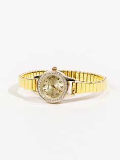 This sparkling watch is the perfect way to add a touch of glamour to your everyday look. With its comfortable stretch band and dazzling crystal face, this watch is sure to turn heads. Whether you're running errands or dressing up for a night out, this watch is the perfect accessory. Adjustable Gold Watch Band, Gold Watch Accessories With Adjustable Bracelet Strap, Yellow Gold Watch Bracelet Strap, Dainty Stretch Watch, Gold Rhinestone Crystal Watch, Wedding Branding, Altard State, Stretch Bands, Plus Size Shopping