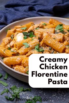 creamy chicken florentie pasta in a white bowl