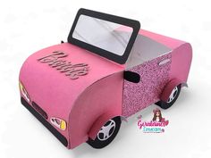 a pink ice cream cart with the word happy birthday on it's front and side