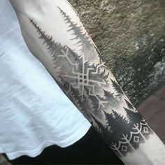 a person with a tattoo on their arm