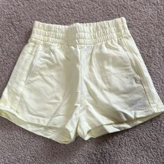 Adidas 3 Stripes Shorts, Lined Pockets With White Trim And White Logo On Left Thigh, Light Lemon Yellow In Color, High Rise With Elastic Waist Band,1.5” Inseam. Nwt Adidas Cotton Bottoms With Built-in Shorts, Adidas Athleisure Shorts For Spring, Trendy Adidas Bottoms For Summer, Trendy Adidas Bottoms For Spring, Adidas Stretch Bottoms For Summer, Adidas Shorts With Pockets For Spring, Adidas Summer Bottoms With Elastic Waistband, Adidas Summer Bottoms With Pockets, Summer Adidas Bottoms With Elastic Waistband