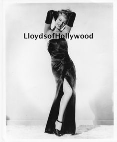 8x10 Glossy photograph. Recent print. Please note my lloyds ofhollywood logo will not be on the print you receive. I will ship up to six photographs in one envelope for one shipping charge.. Shipping in USA is free and International shipping is 17.00 Gilda 1946, Rita Hayworth Gilda, Dress And Gloves, Satin Noir, Black Satin Dress, Rita Hayworth, Black Satin, White Photography, Satin Dresses