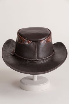 Falcon Hand-Tooled Leather Cowboy Hat | Overland Fitted Leather Hat With Curved Brim, Fitted Leather Top Hat With Flat Brim, Fitted Leather Hat With Short Brim, Adjustable Curved Brim Hat With Leather Lining, Western Hats With Leather Lining And Flat Brim, Adjustable Hat With Leather Lining And Curved Brim, Brimmed Leather Hat For Outdoor, Leather Brimmed Hat For Outdoor, Brown Leather Top Hat With Curved Brim