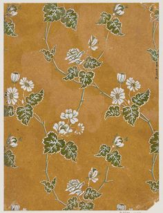 an old paper with white flowers and green leaves on brown background, as well as the words