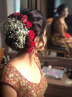 a woman with flowers in her hair