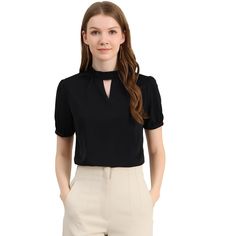 This puff-sleeve mock-neck top gives office chic a whole new meaning. Pleats with a cut-out keyhole and ever-so-slightly voluminous short puff sleeves make this top one of the favorite desk-to-dinner options. With its ruched details at the neckline, this top is a feminine choice to upgrade your workwear or weekend ensembles. The charming piece with a charming keyhole at both the front and back adds femininity to this top. Perfect to pair it with skinny jeans or trousers for a smart casual look. Women Smart Casual, Office Chic, Keyhole Blouse, Dinner Options, Chic Office, Mock Neck Top, Woman Standing, Work Office, Smart Casual