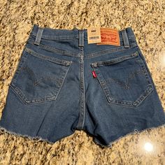 Nwt Levi’s High Rise Shorts Blue Size 24/00. High Rise. Slim Through The Hip And Thigh. Has Stretch. # 3333 *Currently I’m Unable To Provide Any Additional Model Photos Of Myself Due To Medical Condition, Thanks For Understanding!* Check Out My Closet For More Like This! Bundle And Save. Please No Lowballing, No Rude Comments, No Trades Get 20% Off Certain Items With Bundles Of 3 Or More Items!! Only Items With “Get 20% Off“ Apply!!! Levi 501 Shorts, Dark Denim Shorts, High Rise Denim Jeans, Festival Shorts, Frayed Denim, High Rise Denim Shorts, Levi Shorts, Cute Outfit Ideas, High Waisted Shorts Denim