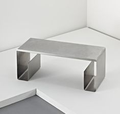 a table that is sitting in the middle of a room with no one around it