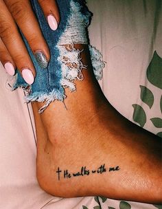 a woman's foot with a tattoo that says, thanks to the one