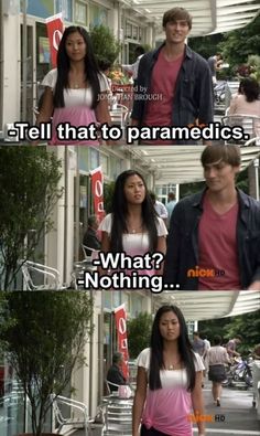 two people walking down the street with one person saying tell that to paramedics