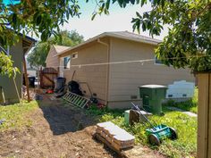 the back yard is being worked on by someone who's working in their backyard