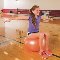 Enjoy a versatile workout with these lightweight exercise and therapy balls, perfect for various activities like jumping, balancing, and exercising. Crafted as one seamless piece with a roto-molded design, these balls offer enhanced durability with a thick vinyl skin. The tacky, non-slip surface ensures a secure grip during workouts, making them easy to handle. Each ball is designed to support up to 200 lbs, providing stability for a range of exercises. With colors that may vary, these balls off Exercise Therapy, Therapy Ball, Clear Tote Bags, Exercise Ball, Active Play, Sports Balls, Physical Education, Play Activities, Sports Gear