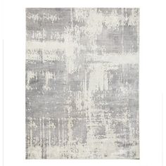 a gray and white rug with an abstract design