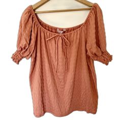 Brand: Amana Size: 1x Condition: New With Tags Description: Peasant Style Blouse From Made In Mexico Company Amana. Muted Orange Color Has Boho Vibes, To Mix With Patterned Bottoms, And Textured Material Adds Visual Appeal. Can Be Worn On Or Off The Shoulders. Cuffed Short Sleeves Create A Puff Sleeve Effect. Super Stretchy & Soft Poly/Cotton/Spandex Blend. Measurements (Approx, From Flat Lay): Pit: 24.5" Length: 22" (From Top Of Bust To Hem) Ships Quickly From A Clean, Smoke Free Home. Open To Fall Peasant Top With Short Sleeves, Fall Short Sleeve Peasant Top, Muted Orange, Wrap Top Blouse, White Lace Shorts, Scoop Neck Blouses, Flare Top, Orange Blouse, Peasant Style