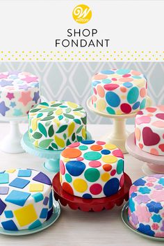 colorful cakes with polka dot designs on them and the words shop fondant written in large letters