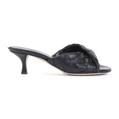 Bottega Veneta Blink black lamb leather mules showcase a refined silhouette featuring a round open toe and a distinctive folded Intrecciato leather strap. The covered heel enhances elegance, while the branded leather insole and outsole provide comfort for every step. Perfect for chic occasions or casual outings.

- Material: 100% Lamb Leather  
- Branded insole and outsole  

- Dimensions: Heel Hight: 5cm Luxury Round Toe Strap Heels, Luxury T-strap Sandals With Round Toe, Luxury Black Round Toe Heels, Luxury Elegant T-strap Sandals With Open Toe, Bottega Veneta Mules, Elegant Flats, Leather Cap, 2 Inch Heels, Leather Mules