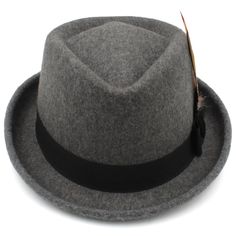 You're cooler than you know you are when you've achieved something. To award yourself for an accomplishment, take advantage of this Fedora Trilby Hat by Innovato Design. Its multicolored feather attached to the black hatband says that you are a winner for reaching a milestone. Tell your friends about it and they'll surely congratulate you. Made with 100% wool material, this hat is high-quality, breathable and comfortable. Its exquisite workmanship makes this fashion find durable and trusted by many of its buyers. It is stylish and versatile, suitable for matching different occasions. You can wear this with your formal, elegant and vintage style in spring, autumn, and winter. This is perfect for outdoors, travel, parties, and formal occasions.  Product Highlights:   Made from 100% wool mate Trilby Fedora, Dolphin Bracelet, Wood Inlay Rings, Dragon Star, Couples Wedding Bands, Wool Fedora Hat, Punk Accessories, Trilby Hat, Masonic Ring