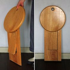 two pictures of a wooden toilet seat being held up by someone's hand and another showing the back side of it