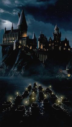 the hogwarts castle is lit up at night