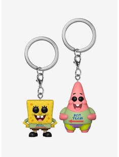 two key chains with cartoon characters on them