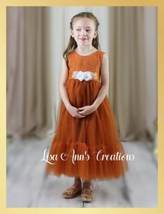 This stunning Burnt Orange Mermaid Style Junior Bridesmaid Dress, complete with a sleeveless design, is perfect for your little angel to make her presence felt on your special day. Crafted with attention to detail, this dress is not just a dress but a keepsake that will make memories last a lifetime. Pin it now if you are planning on making your little one the most stylish flower girl on the block! Sleeveless Bridesmaid Princess Dress With Lace Trim, Sleeveless Princess Dress With Lace Bodice And Tulle, Sleeveless Tulle Princess Dress With Lace Bodice, Fitted Sleeveless Princess Dress With Tulle Skirt, Sleeveless Pageant Dress With Sheer Bodice, Lace Tutu Dress With Lace Trim For Pageants, Lace Tutu Dress With Lace Trim For Pageant, Sleeveless Ruffled Bridesmaid Princess Dress, Sleeveless Lace Patchwork Dress For Dress-up